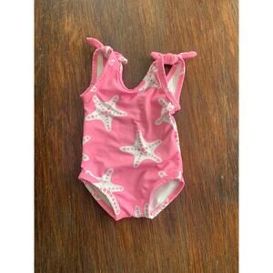 monica and andy pink swimsuit